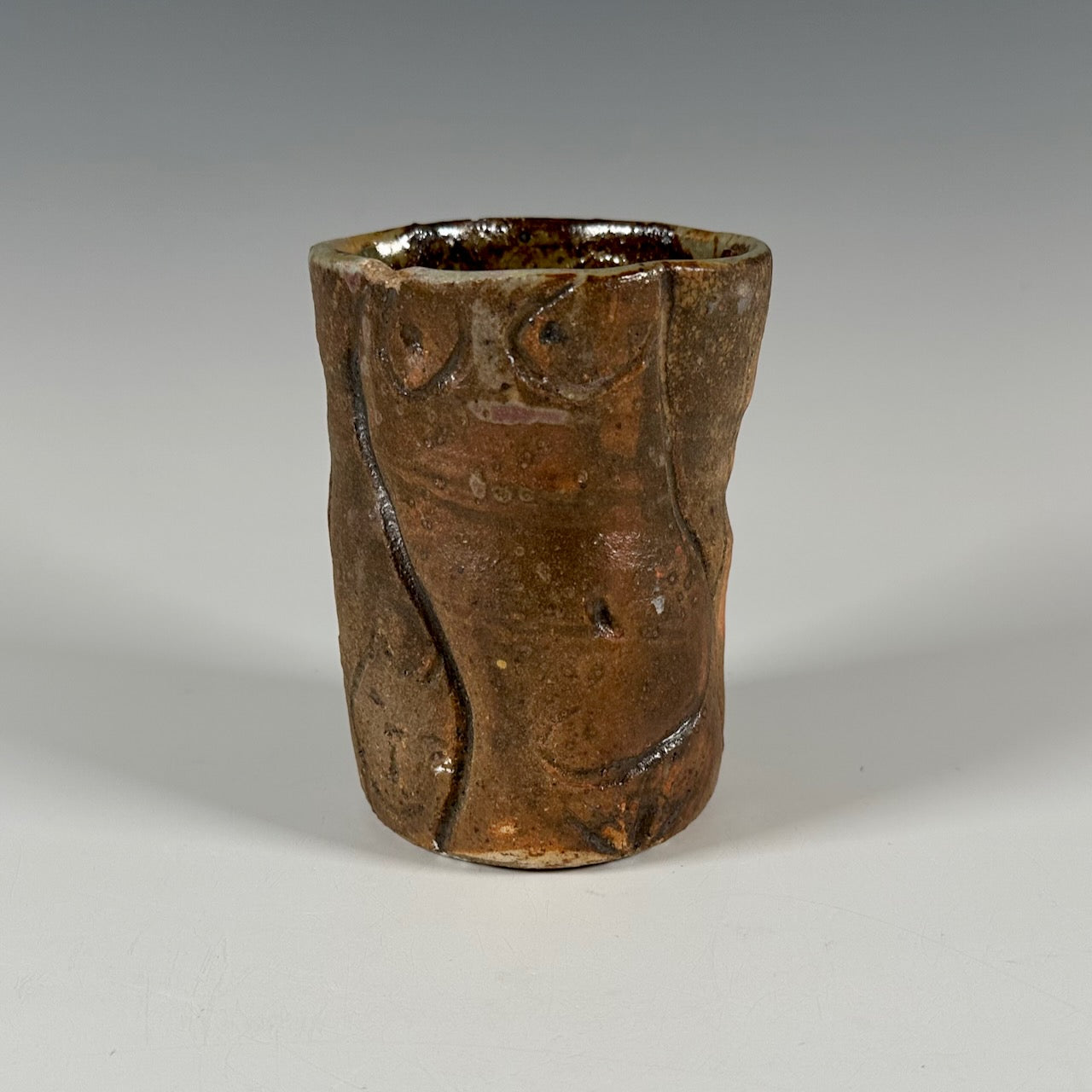 Mike Norman torso tumbler