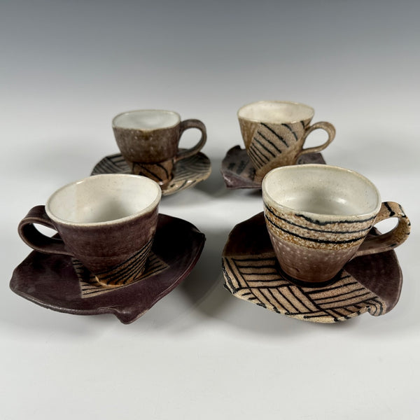 Paul Morse cups and saucers, set of four