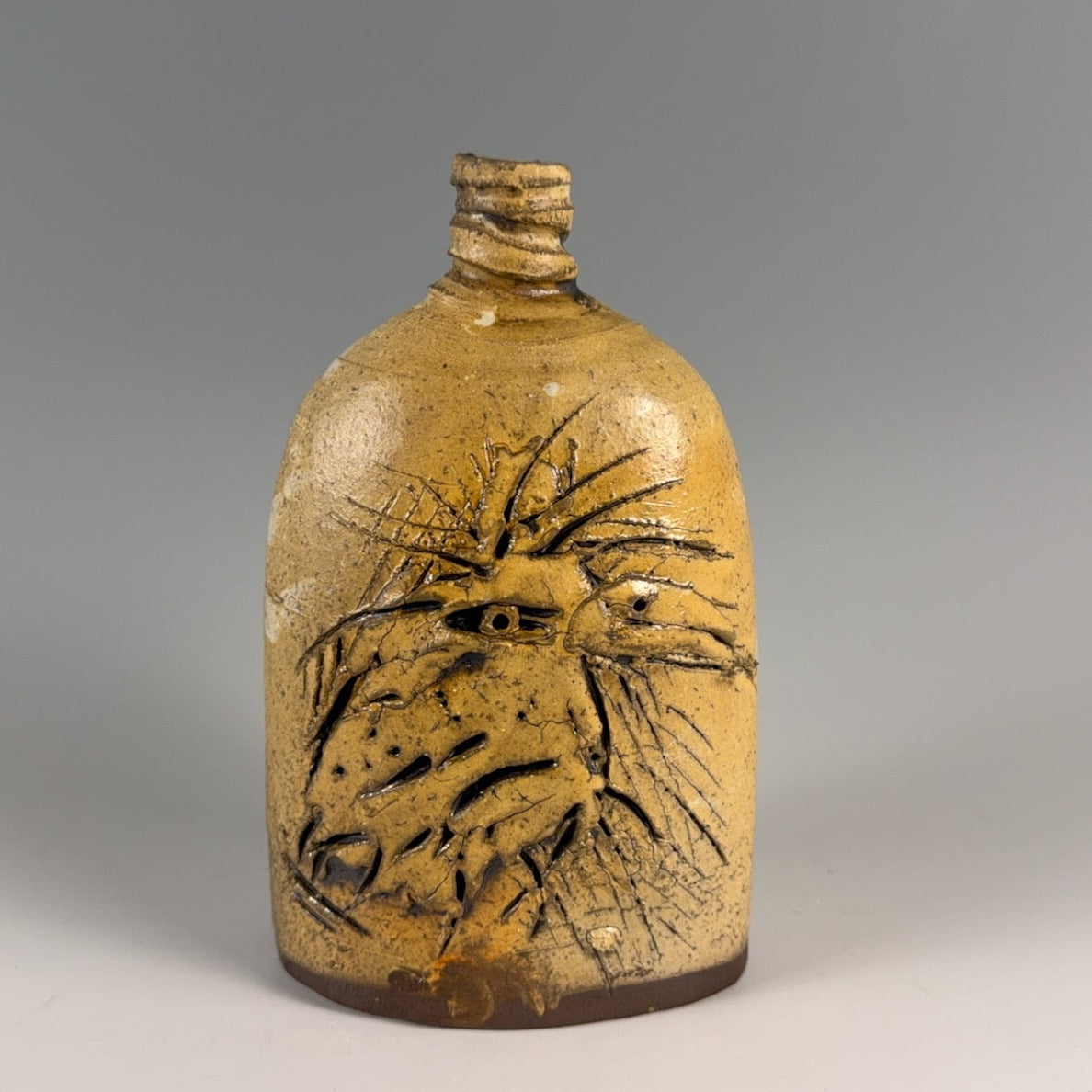 Ron Meyers bottle form with bird