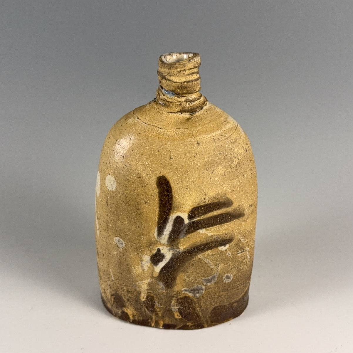 Ron Meyers bottle form with bird